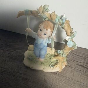 Charming Porcelain Boy on Swing Figurine